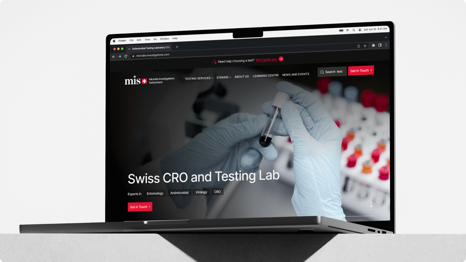 MIS website — Swiss CRO and Testing Lab, shown on a laptop